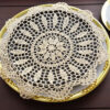Round crochet doily, wheat color
